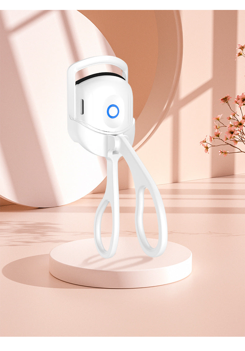 Heated eyelash curler